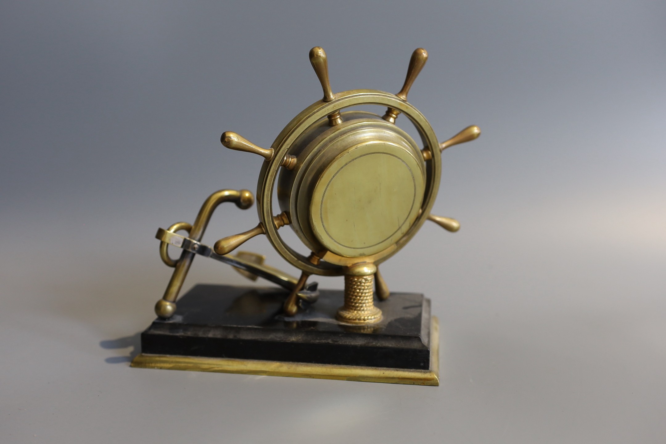 A Victorian brass and black slate nautical themed desk timepiece, width 19cm height 20cm